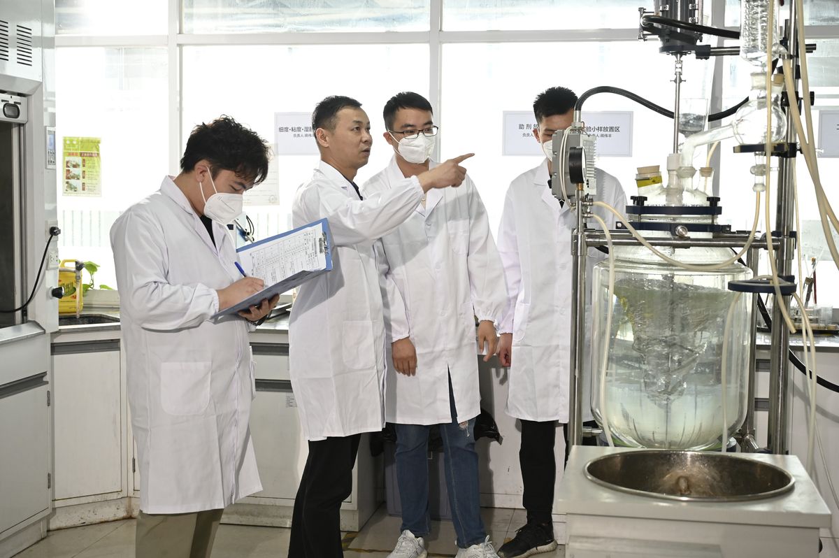 Research team at a pilot reactor